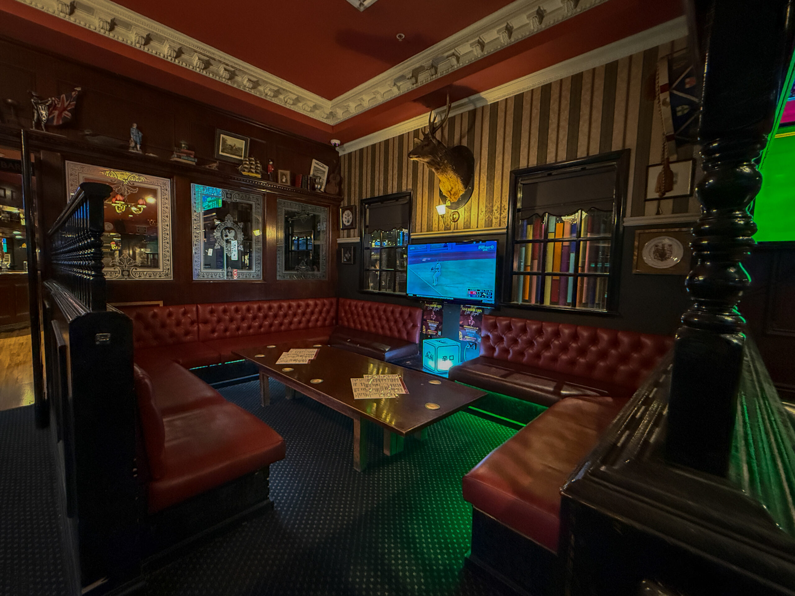 booth-hire-melbourne-central-lion Private booth at Melbourne Central Lion with seating for up to 20 guests, featuring a personal TV and drinks service